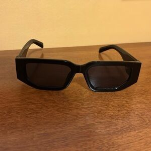 Prada - sunglasses